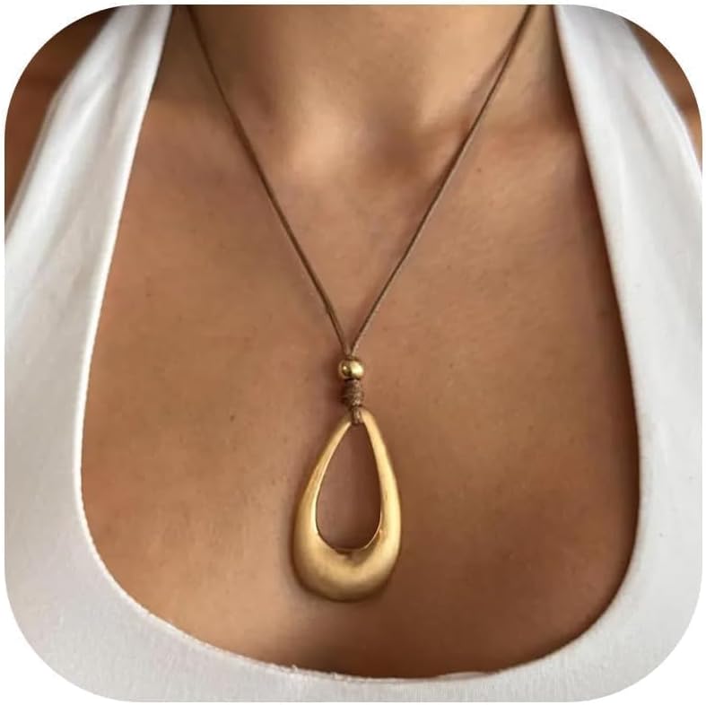 Abstract Gold Tone Pendant Necklace with Black Cord - Image 17