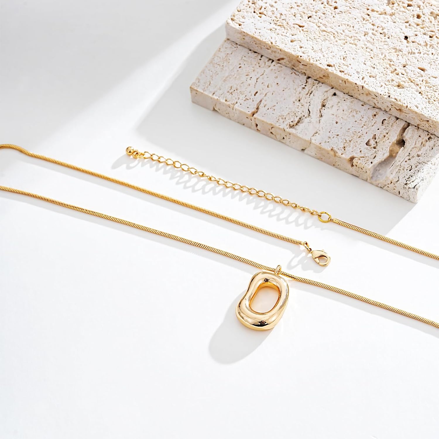 Gold Tone Abstract Pendant Necklace with Snake Chain - Image 7